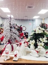 White “Frosted” Tree, Artificial White Poinsettia, Assorted White Ceramic Figurines, White Candles